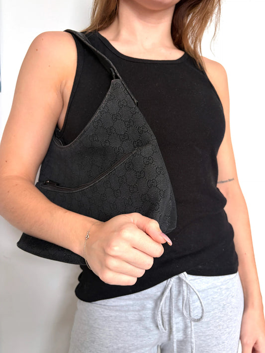 Gucci black hobo shoulder bag with GG monogram denim jacquard and leather piping.