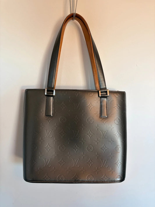 Louis Vuitton grey tote bag embossed monogram, metallic sheen, silver-tone hardware.