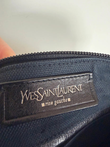 Yves Saint Laurent black Mombasa sling bag with YSL Cassandre logo and silver-tone details.