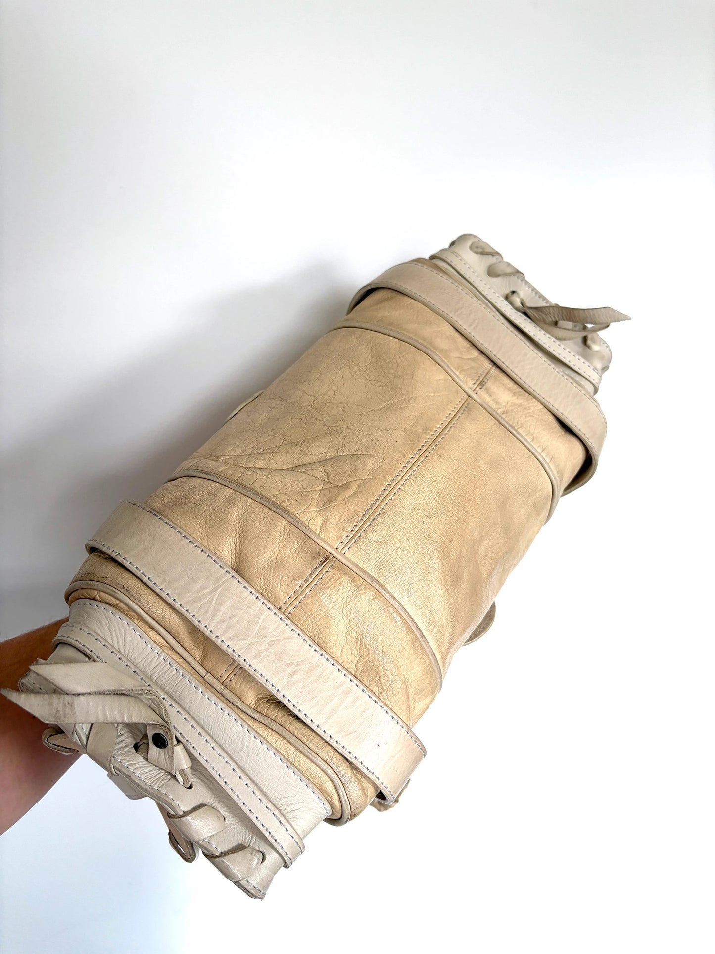 Chloé cream leather Silverado bag with braided handles and oxidized gunmetal studs.