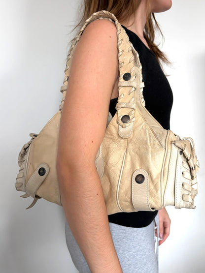 Chloé cream leather Silverado bag with braided handles and oxidized gunmetal studs.