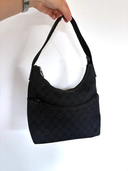 Gucci black hobo shoulder bag with GG monogram denim jacquard and leather piping.