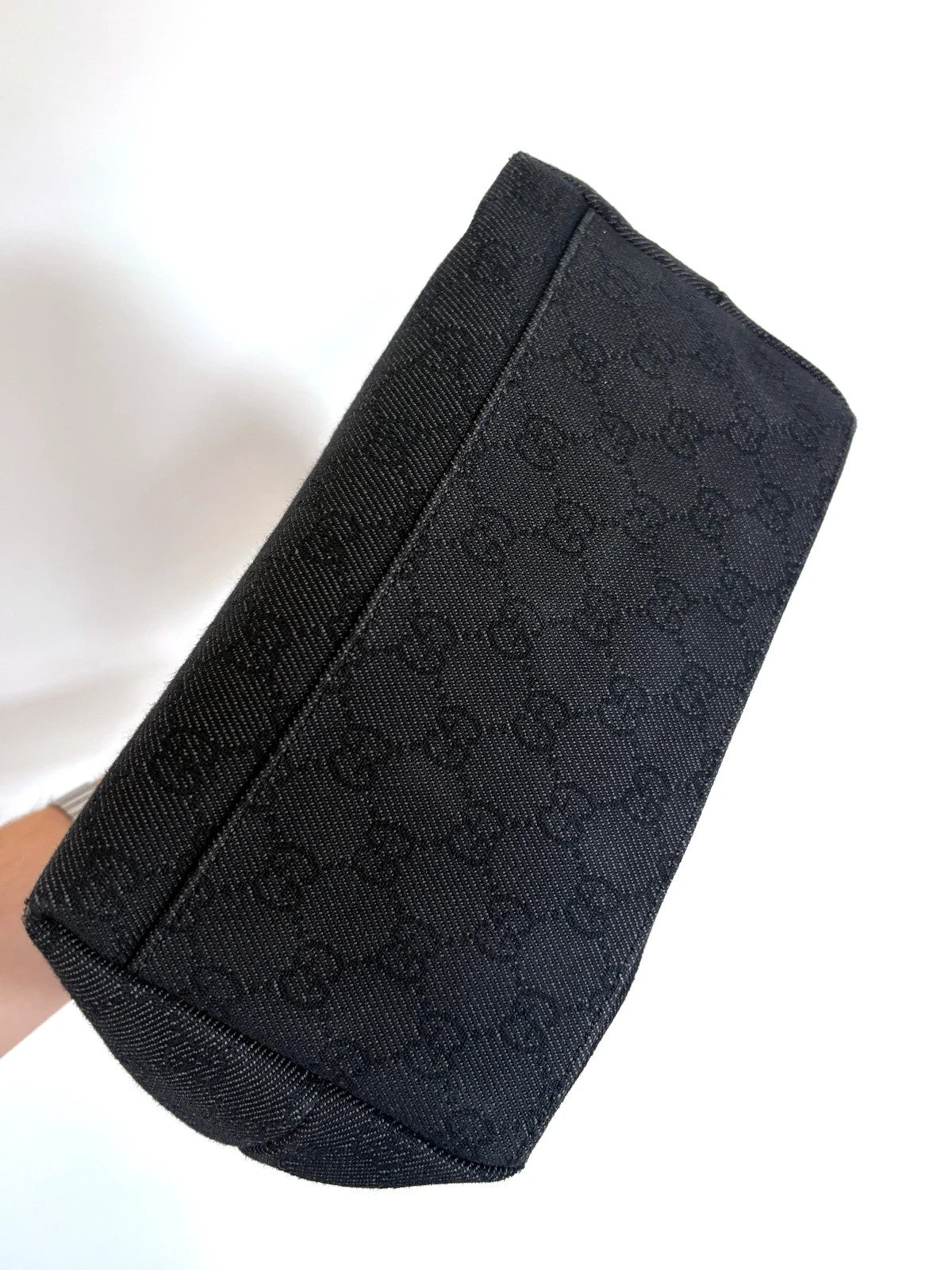 Gucci black hobo shoulder bag with GG monogram denim jacquard and leather piping.