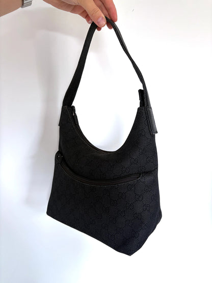 Gucci black hobo shoulder bag with GG monogram denim jacquard and leather piping.