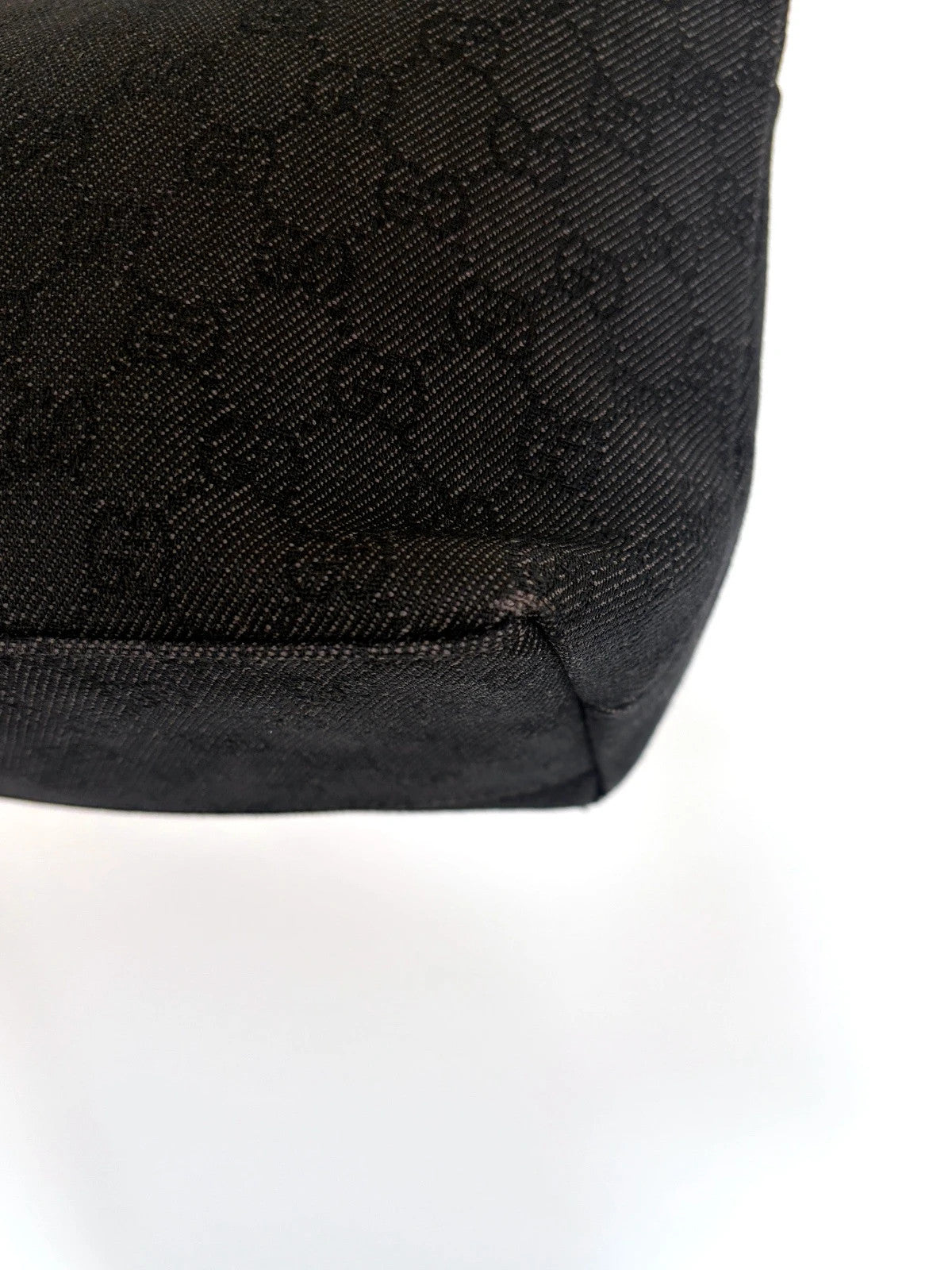 Gucci black hobo shoulder bag with GG monogram denim jacquard and leather piping.