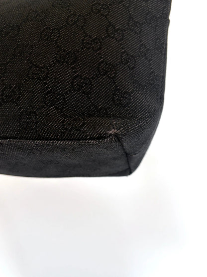 Gucci black hobo shoulder bag with GG monogram denim jacquard and leather piping.