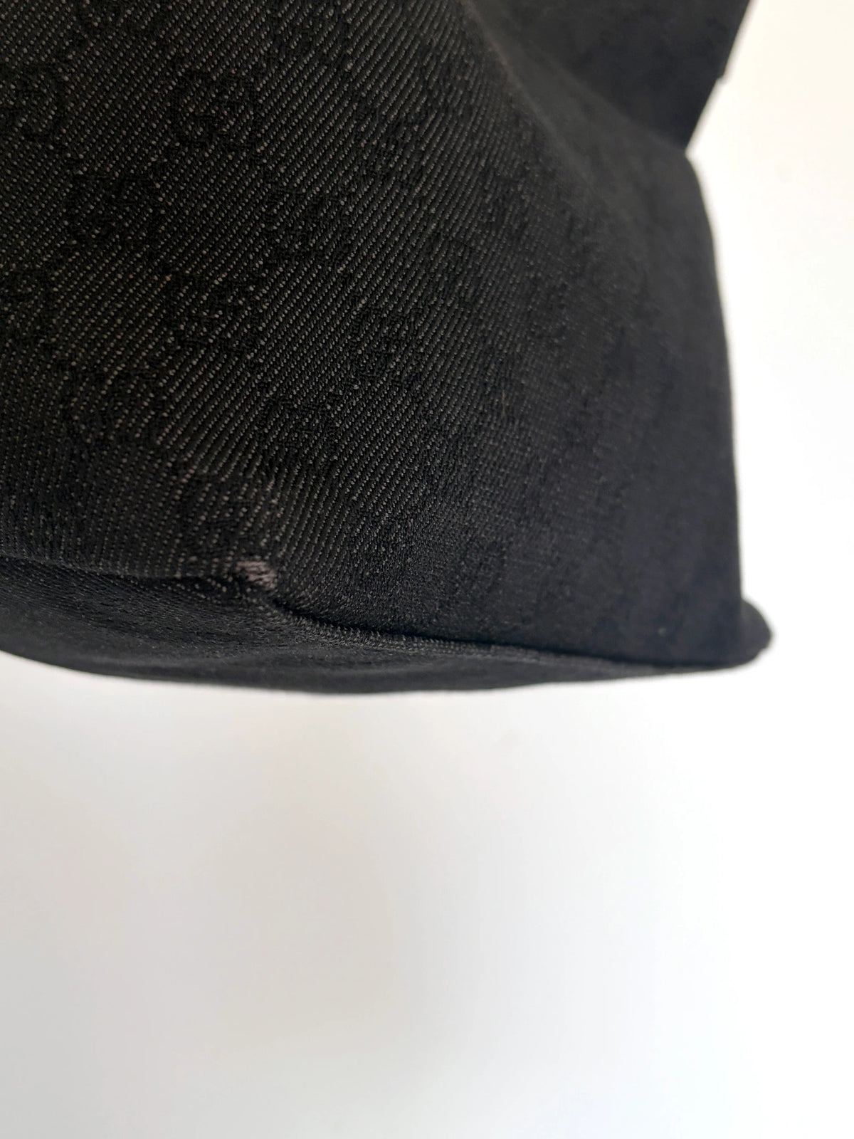 Gucci black hobo shoulder bag with GG monogram denim jacquard and leather piping.