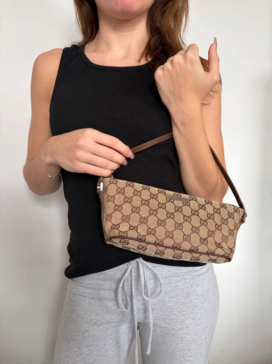 Gucci beige and brown canvas boat pochette bag with logo and intact corner piping.