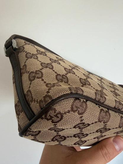 Gucci beige and brown canvas boat pochette bag with logo and intact corner piping.