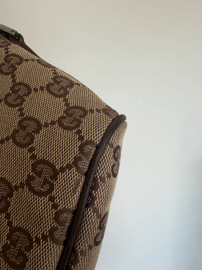 Gucci beige and brown canvas boat pochette bag with logo and intact corner piping.