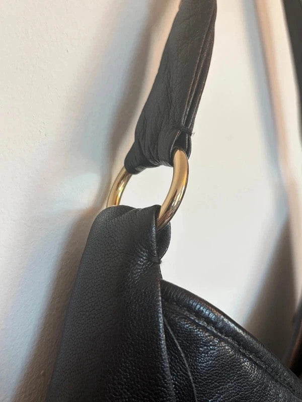Yves Saint Laurent black leather Saint Tropez hobo with tiered panels and gold-tone logo plaque