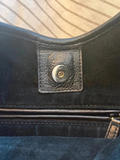 Yves Saint Laurent black leather Saint Tropez hobo with tiered panels and gold-tone logo plaque