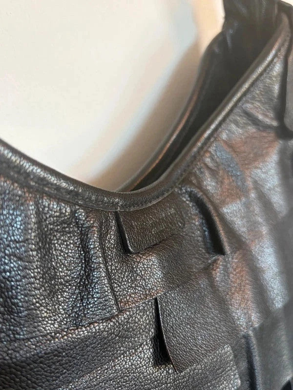 Yves Saint Laurent black leather Saint Tropez hobo with tiered panels and gold-tone logo plaque