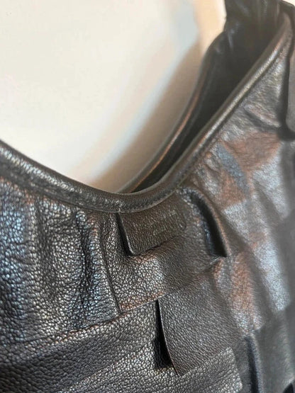 Yves Saint Laurent black leather Saint Tropez hobo with tiered panels and gold-tone logo plaque
