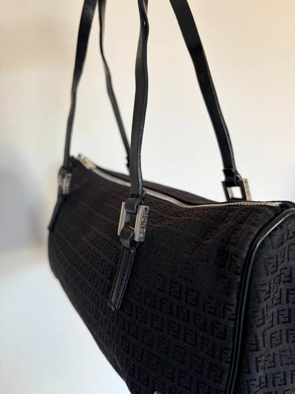 Fendi black shoulder bag with Zucchino monogram canvas, silver-tone hardware, and leather trim.