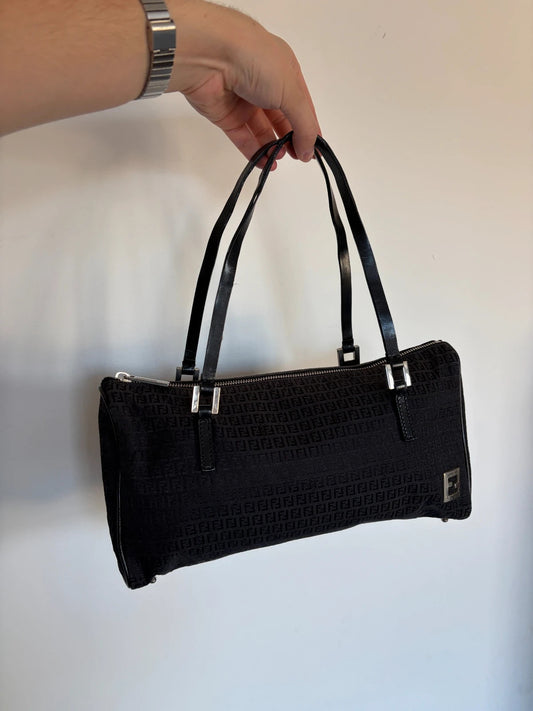 Fendi black shoulder bag with Zucchino monogram canvas, silver-tone hardware, and leather trim.
