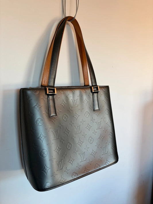 Louis Vuitton grey tote bag embossed monogram, metallic sheen, silver-tone hardware.
