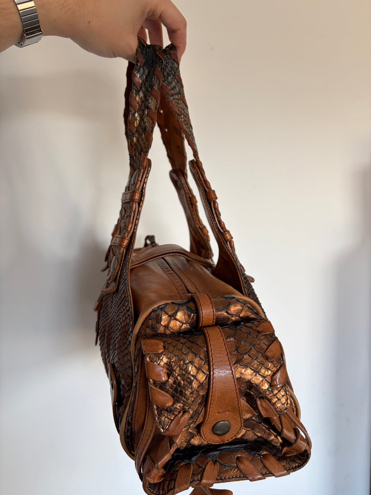 Chloé Silverado bag in metallic bronze python with whipstitched handles and studs