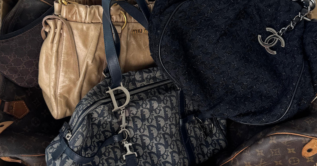 Collection of various designer handbags including Chanel and Dior.