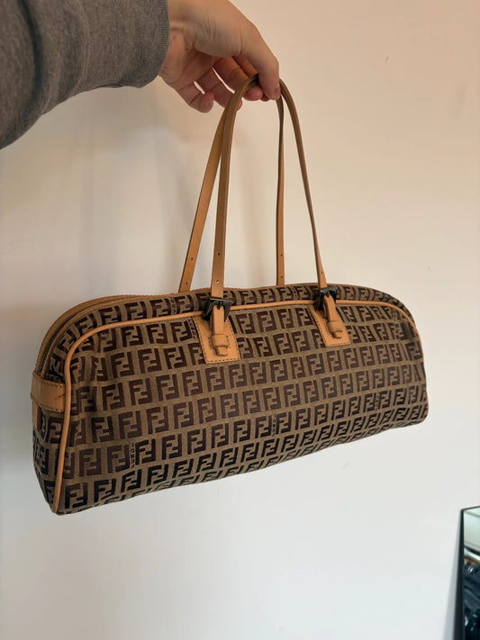 Fendi Bauletto Zucchino shoulder bag in beige and brown micro-Zucchino canvas with leather trim.