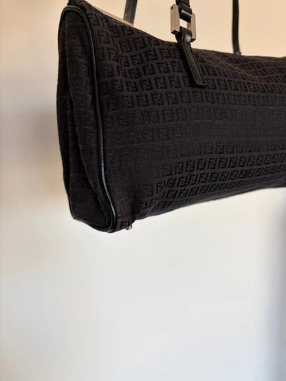 Fendi black shoulder bag with Zucchino monogram canvas, silver-tone hardware, and leather trim.