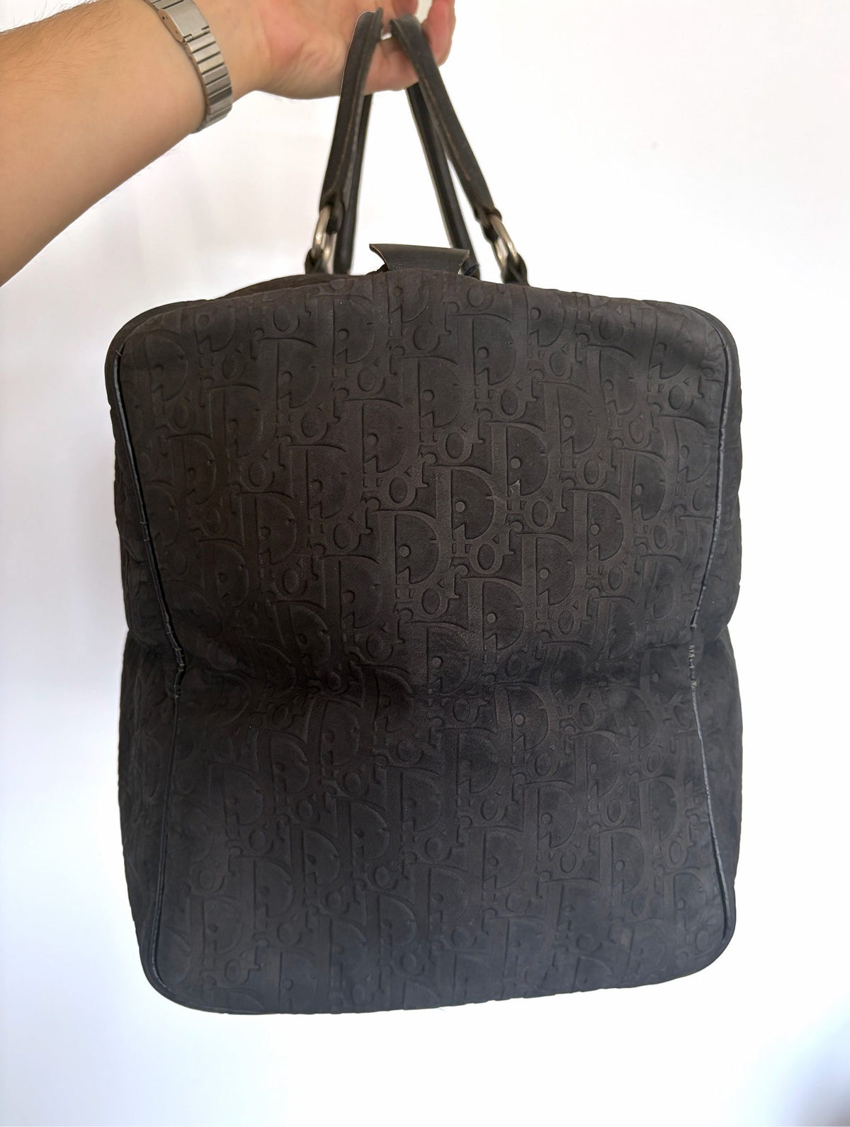 Christian Dior black duffel bag embossed jacquard fabric with leather trim and handles.